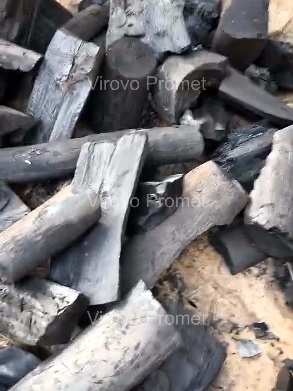 Halaban charcoal — long, dense pieces poured from the sack
