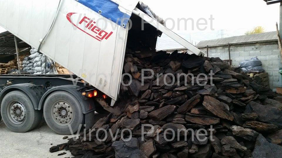 Lump charcoal tipped from a truck