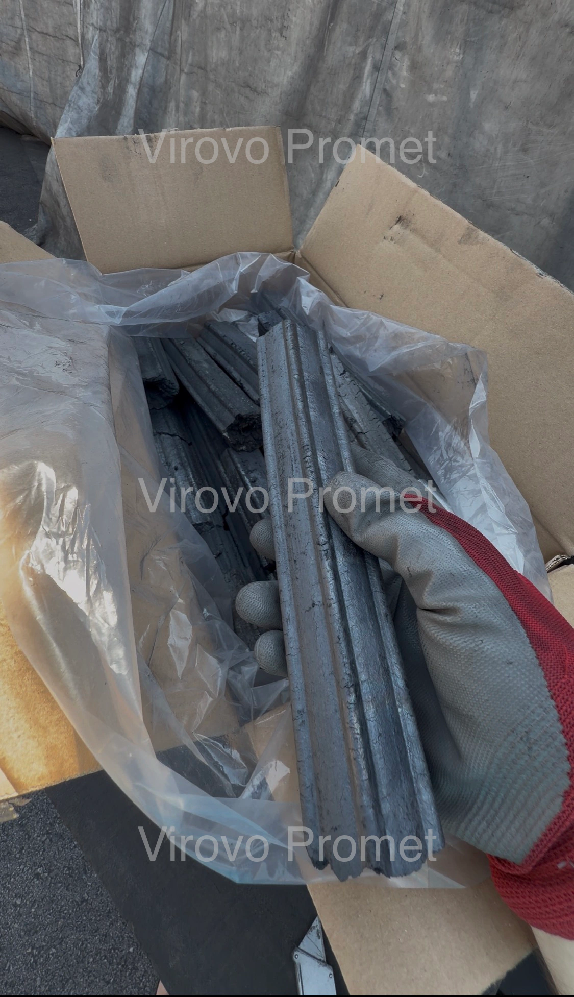 Pressed hardwood briquettes wrapped for retail