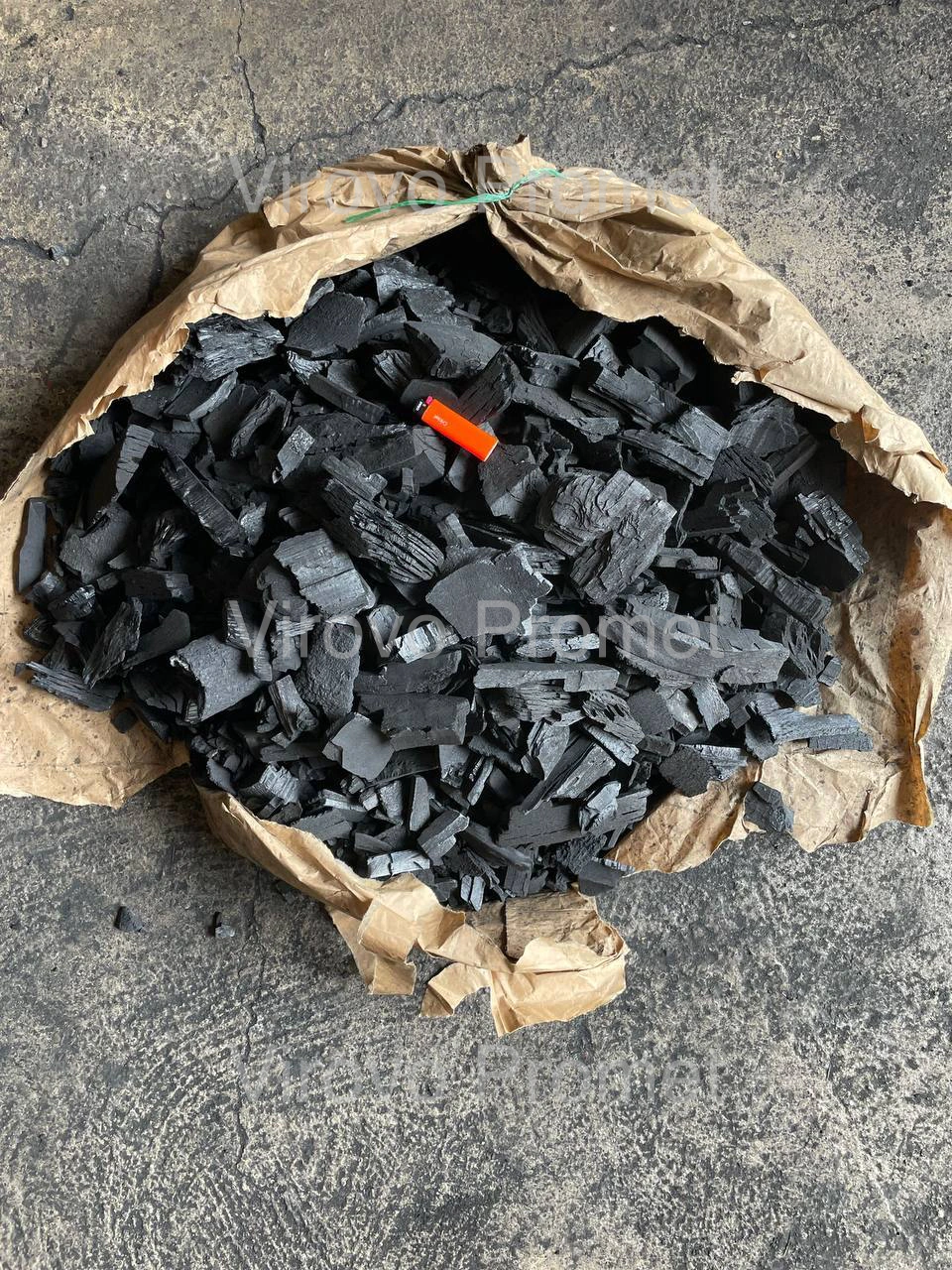 Beech charcoal pieces in an open bag