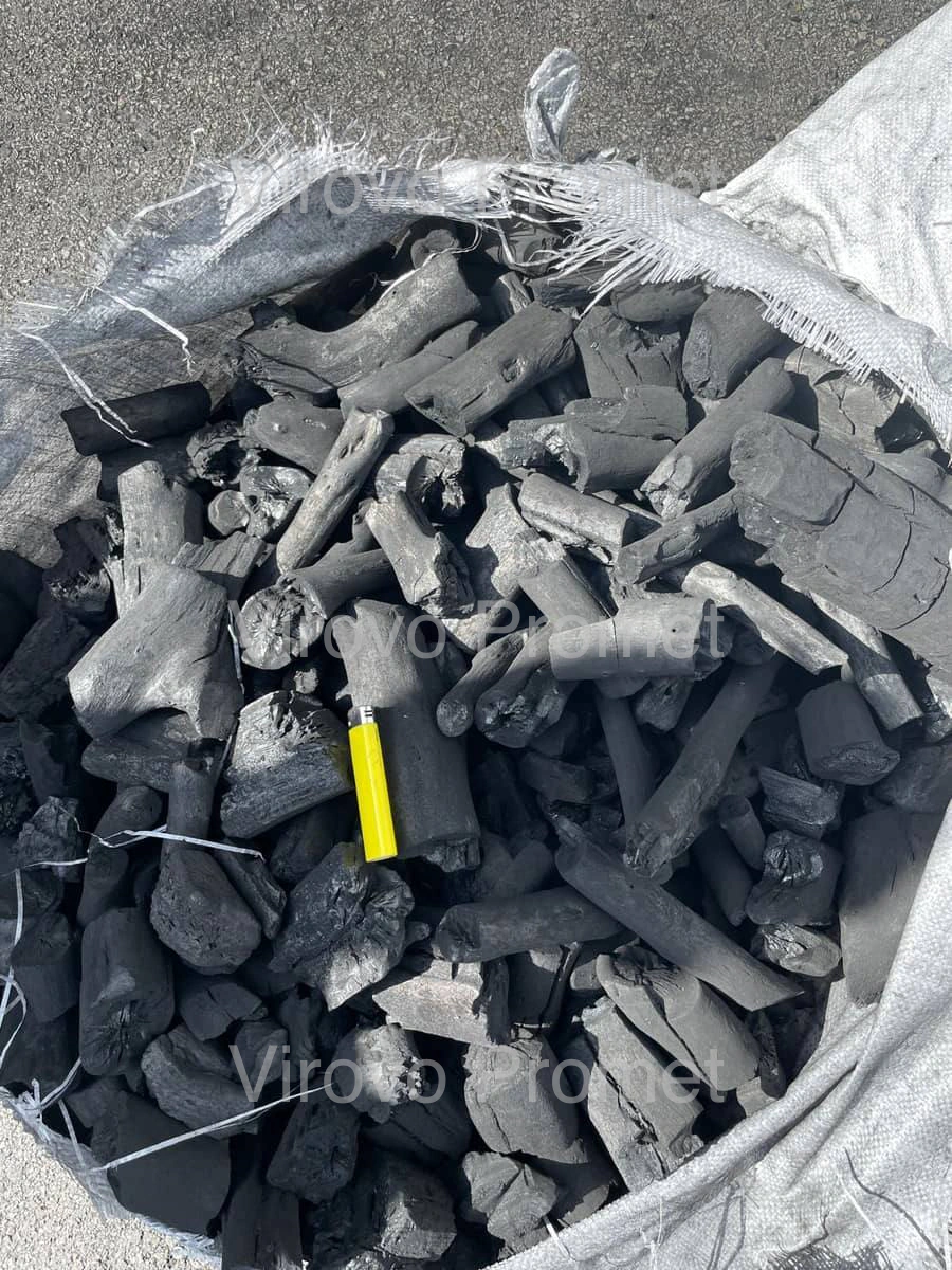 Marabu charcoal lumps in an open bag